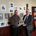 Presenting Willie Penrose with a framed URBAN HORSES meme at Edgeworthstown PIETA House exhibition
